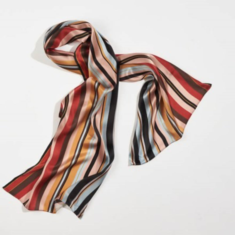 A refined silk scarf designed to elevate both everyday outfits and special occasions.